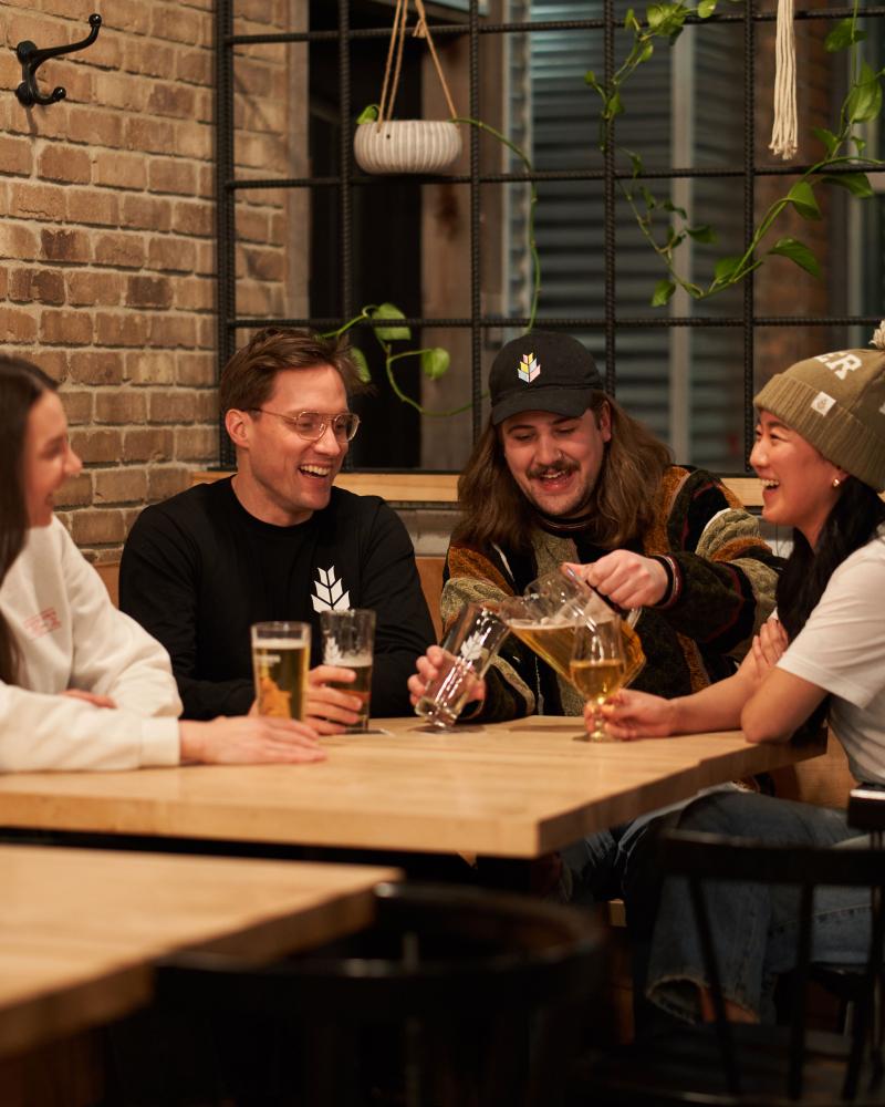 friends with beers and pitcher