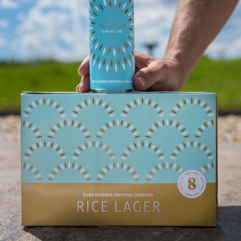 rice lager can on top of 8 pack box