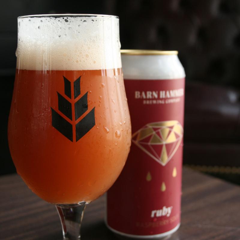 ruby in a glass can in background